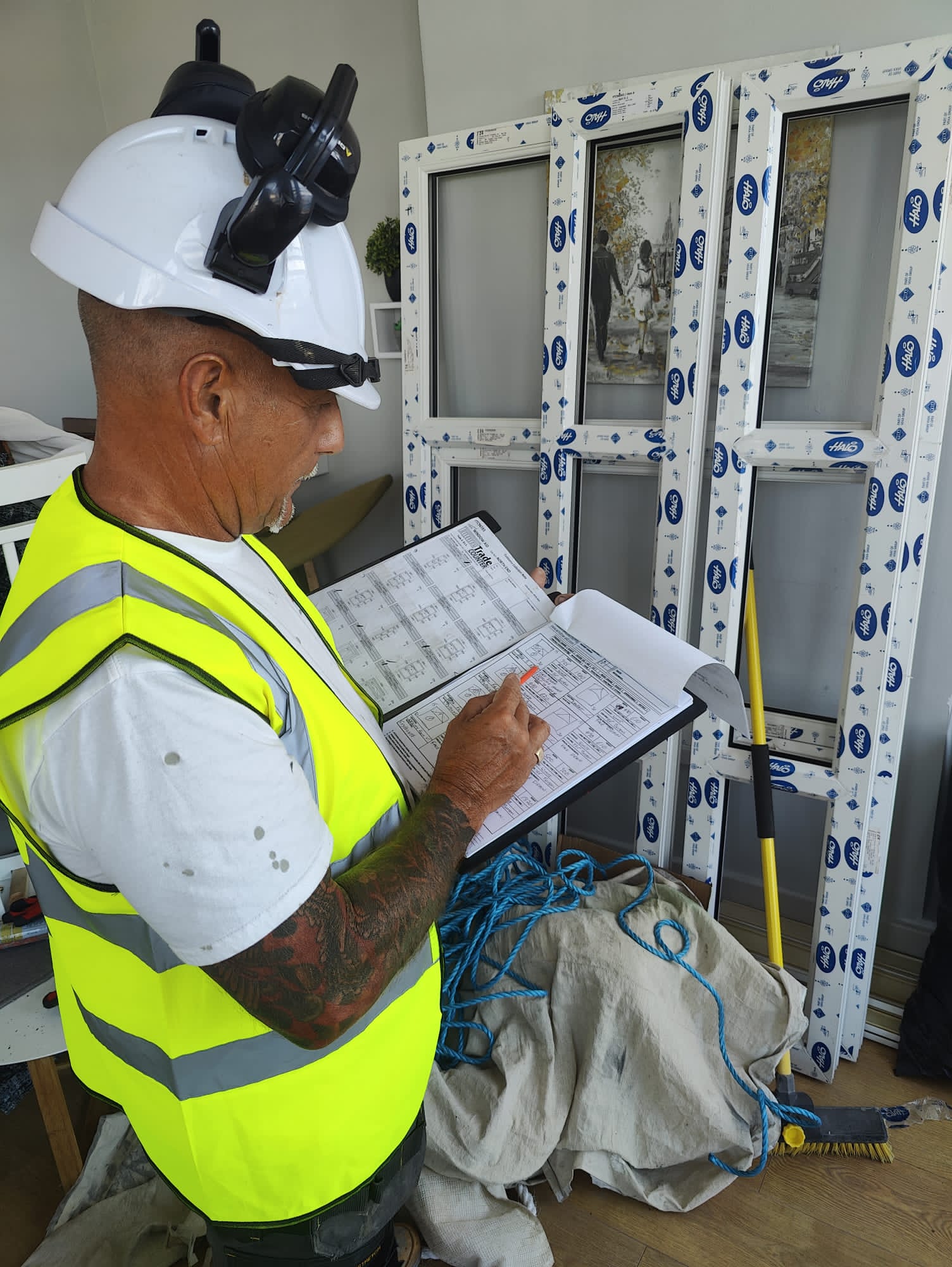 Window Aid Group operative conducting onsite inspection checks